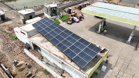 Aerial-View-Of-Solar-Panels-Above-Gas-Station-Shop-In-Badin,-Pakistan