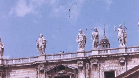 Impressive-Statues-on-Top-of-San-Peters-Basilica-Under-Blue-Sky-in-the-1960s