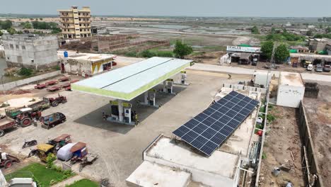 Aerial-View-Of-Solar-Panels-Above-Gas-Station-Shop-In-Badin,-Pakistan