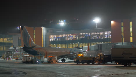 Aircraft-of-Flydubai-at-Terminal-E-of-Sheremetyevo-Airport-at-night-Moscow