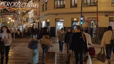 Crowded-street-crosswalk-in-night-Valencia-Spain