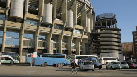 Outside-view-of-Santiago-Bernabeu-Stadium-with-transport-parked-nearby-Madrid