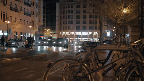 Pedestrians-crossing-the-road-in-night-Valencia-Spain