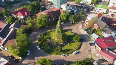Aerial-Overhead-View-Of-That-Dam-On-Roundabout-In-Vientiane,-Laos-On-Sunny-Day