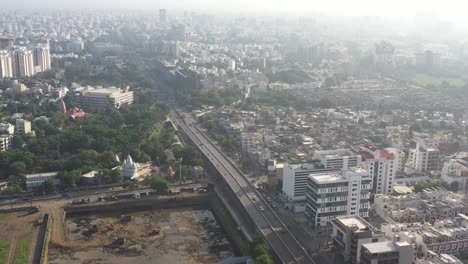 Rajkot-city-aerial-view-aerial-u-top-angle-from-dawn-going-forward-and-big-buildings-and-malls-and-temples-are-visible-around