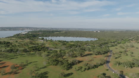 Aerial-video-over-Brasilia's-roads-flying-towards-Lagoa-do-Jaburu-in-the-morning-light