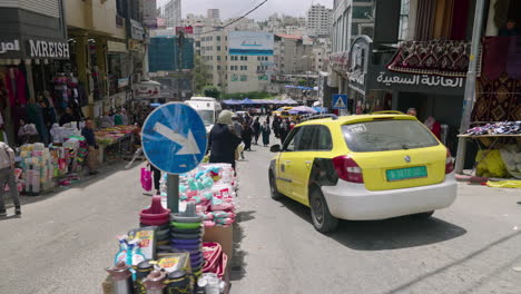 Person's-POV-Walking-In-The-Road-In-The-Marketplace-In-Hebron-City,-Palestine