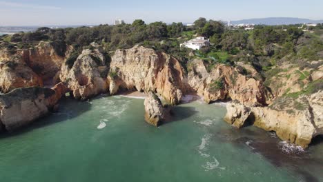 Aerial-View-Of-Portimao-Coastal-Cliffs-On-Sunny-Day