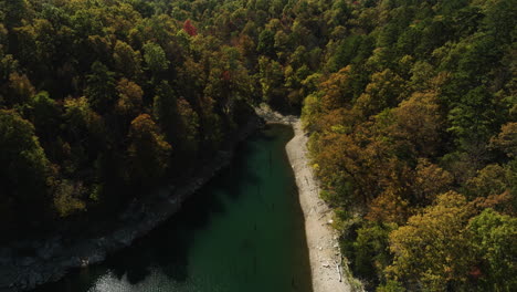 Aerial-Drone-View-Of-A-Lake-With-Pilings-Near-Eagle-Hollow-Cave-In-Bland,-Arkansas,-USA