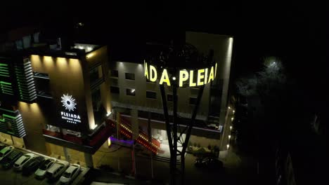 nighttime-frozen-aerial-view-of-Pleiada-Hotel-in-Iasi,-Romania