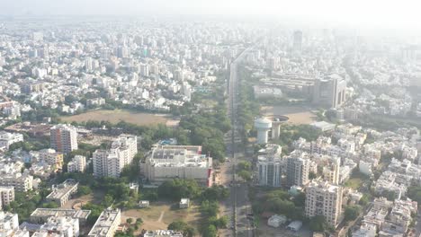 Rajkot-city-aerial-view-The-drone-is-going-ahead-from-the-top-angle-and-there-are-large-grounds-on-both-sides
