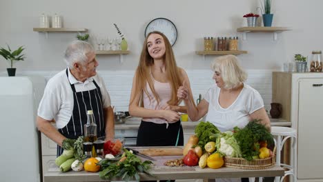 Girl-measuring-with-tape-measure-her-slim-waist-and-braging-in-front-of-grandparents.-Raw-food-diet