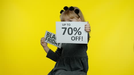 Child-kid-girl-showing-Black-Fridayand-Up-To-70-Percent-Off-discount-advertisement-inscriptions-text