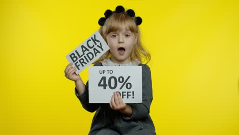 Child-girl-showing-Black-Friday-and-Up-To-40-Percent-Off-advertisement-banners.-Low-prices,-shopping
