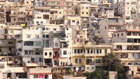 close-up-panning-shot-of-middle-eastern-homes-on-a-hill-in-Tripoli,-Northern-Lebanon
