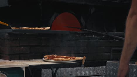 Neapolitan-pizza-baking-in-brick-oven