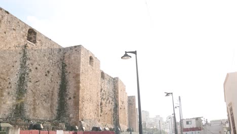 large-stone-wall-of-a-middlea-eastern-castle-on-a-hill-above-Tripoli,-Northern-Lebanon