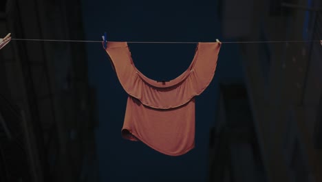 Hanging-Shirt-on-Urban-Clothesline.-Naples,-Italy