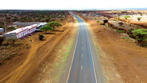 Birdseye-aerial-view-of-rural-roads-in-Kenya,-shanty-poor-neighborhood-of-Loitokitok,-Kenya