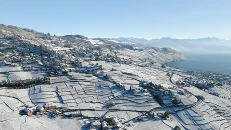 Vineyard-Terraces-Covered-With-Snow-In-Aran-and-Grandvaux-Village-In-Lavaux,-Vaud,-Switzerland