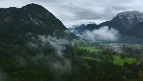 Panoramic-aerial-shot-in-small-Austria's-village-between-mountaintops