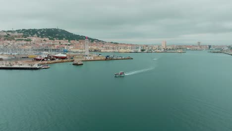 Beautiful-coastal-view-of-port-city-Sete-in-France-with-scientific-boat-on-its-journey