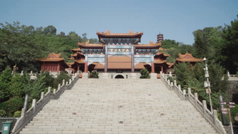 Experience-the-grandeur-of-Nansha-Tin-Hau-Palace-as-our-camera-gracefully-tilts-up,-revealing-the-majestic-main-entrance-of-Nansha-Mazu-Temple