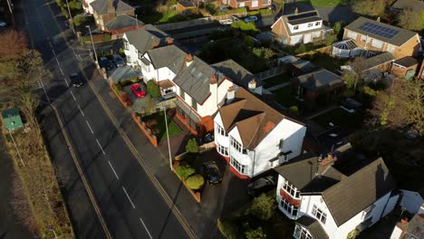 Aerial-view-expensive-British-middle-class-houses-in-rural-suburban-Farnworth-village-neighbourhood