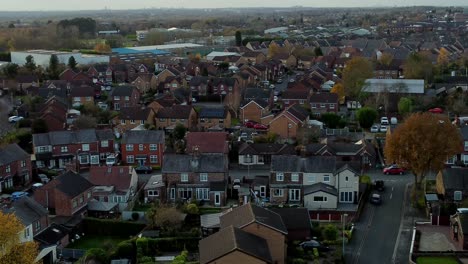 Typical-British-suburban-village-in-Merseyside,-England-aerial-view-over-Autumn-residential-council-neighbourhood