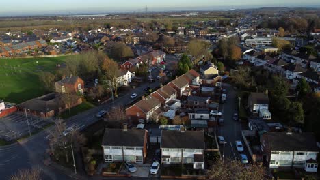 Rainhill-typical-British-suburban-village-in-Merseyside,-England-aerial-view-circling-Autumn-residential-council-neighbourhood