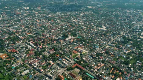 4K-Cinematic-urban-drone-footage-of-a-panoramic-aerial-view-of-the-city-of-Chiang-Mai,-Thailand-on-a-sunny-day