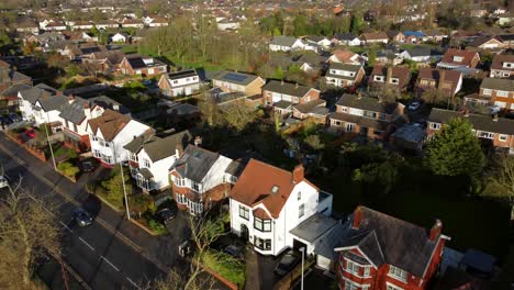 Aerial-view-expensive-English-middle-class-houses-in-rural-suburban-neighbourhood