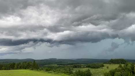 A-violent-thunderstorm-rolling-over-the-hills-in-Elk-County,-Pennsylvania
