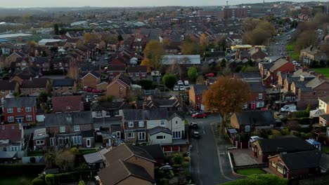 Rainhill-typical-British-suburban-village-in-Merseyside,-England-aerial-view-circling-Autumn-residential-council-neighbourhood