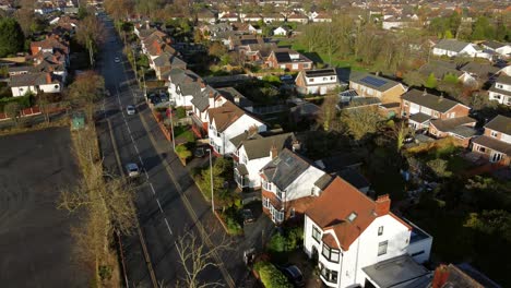 Aerial-view-expensive-British-middle-class-property-in-rural-suburban-neighbourhood-during-autumn