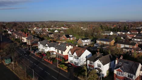 Aerial-view-expensive-British-middle-class-houses-in-rural-suburban-town-community