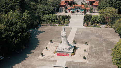 Nansha-Tin-Hau-Palace's-divine-beauty-with-an-aerial-orbit-shot-of-the-goddess-statue-in-China