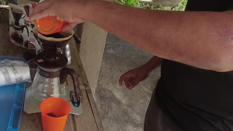 Making-fresh-brewed-coffee-at-hostel-on-coffee-plantation-in-Nicaragua