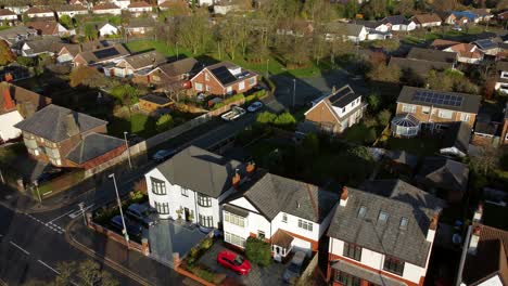 Aerial-view-expensive-British-middle-class-real-estate-in-rural-suburban-Farnworth-neighbourhood