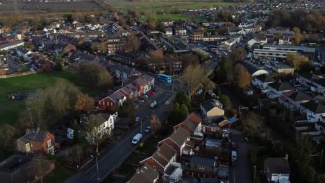 Rainhill-typical-British-suburban-village-in-Merseyside,-England-aerial-view-circling-above-Autumn-residential-council-neighbourhood