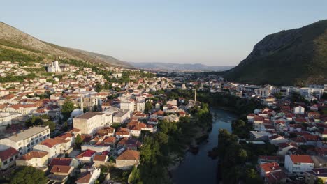 Historic-Mostar-Cityscape-at-Dusk,-Bosnia---Aerial-FlyOver