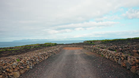 Wide-shot-of-Lava-Rock-for-vineyard-walls-on-Pico-island-in-the-Azores,-Portugal