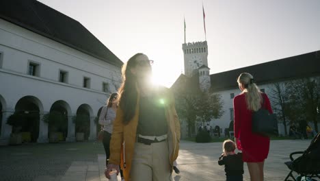 tourist-woman-walking-in-middle-of-Ljubljana-Castle-in-Slovenia-during-spring-break