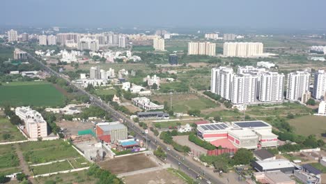 Rajkot-city-aerial-view-Big-high-rise-and-low-rise-buildings-are-visible-on-Kalavad-Road