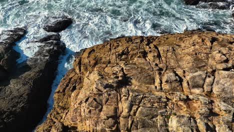 Rocky-Cliffs-With-Splashes-And-Foam-Waves-Breaks-Onto-Shoreline-In-Playa-de-Valcobo,-Arteixo,-La-Coruña,-Spain