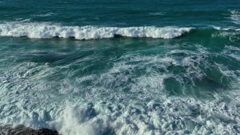 Breathtaking-Slow-Motion-View-Of-Ocean-Waves-Crawling-In-Foamy-Surface