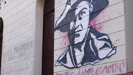Mural,-graffiti-of-El-Presidente-Daniel-Ortega-on-museum-wall-in-Leon