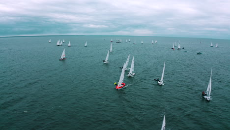 Aerial-view-of-group-of-yachts-racing-in-regatta