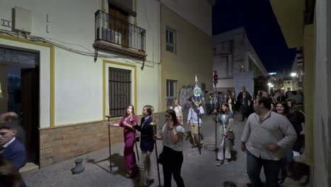 Religious-procession-through-the-streets-of-Seville,-Spain