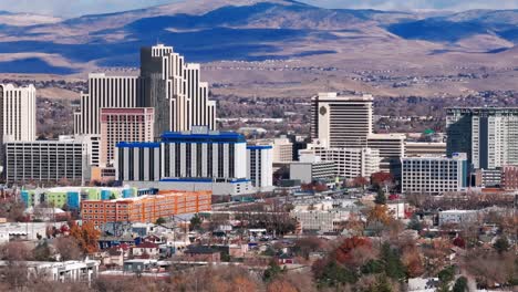 Stationary-drone-shot-of-downtown-Reno,-Nevada-with-Casinos